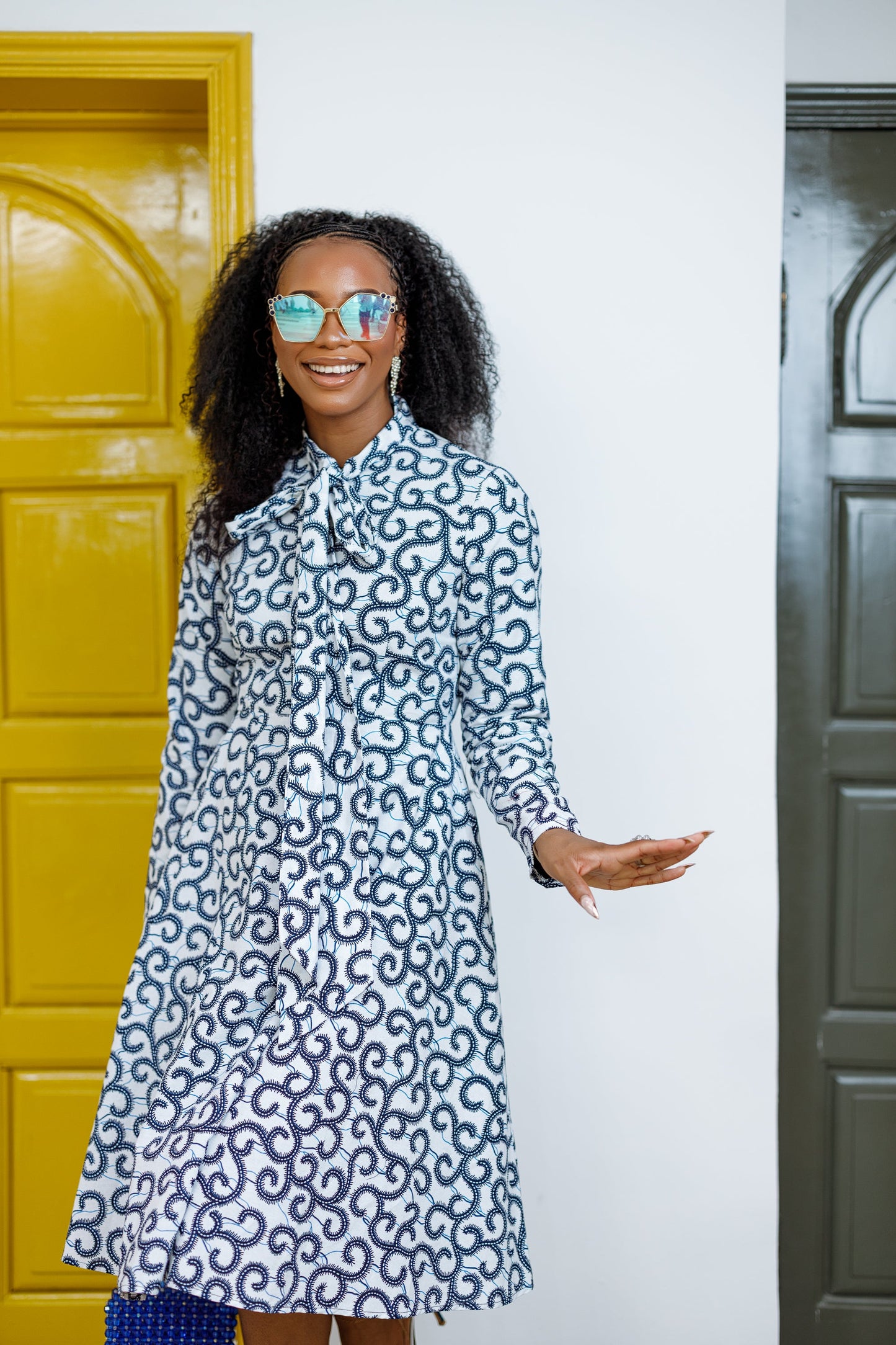 GILDA AFRICAN PRINT TIE-NECK MIDI DRESS