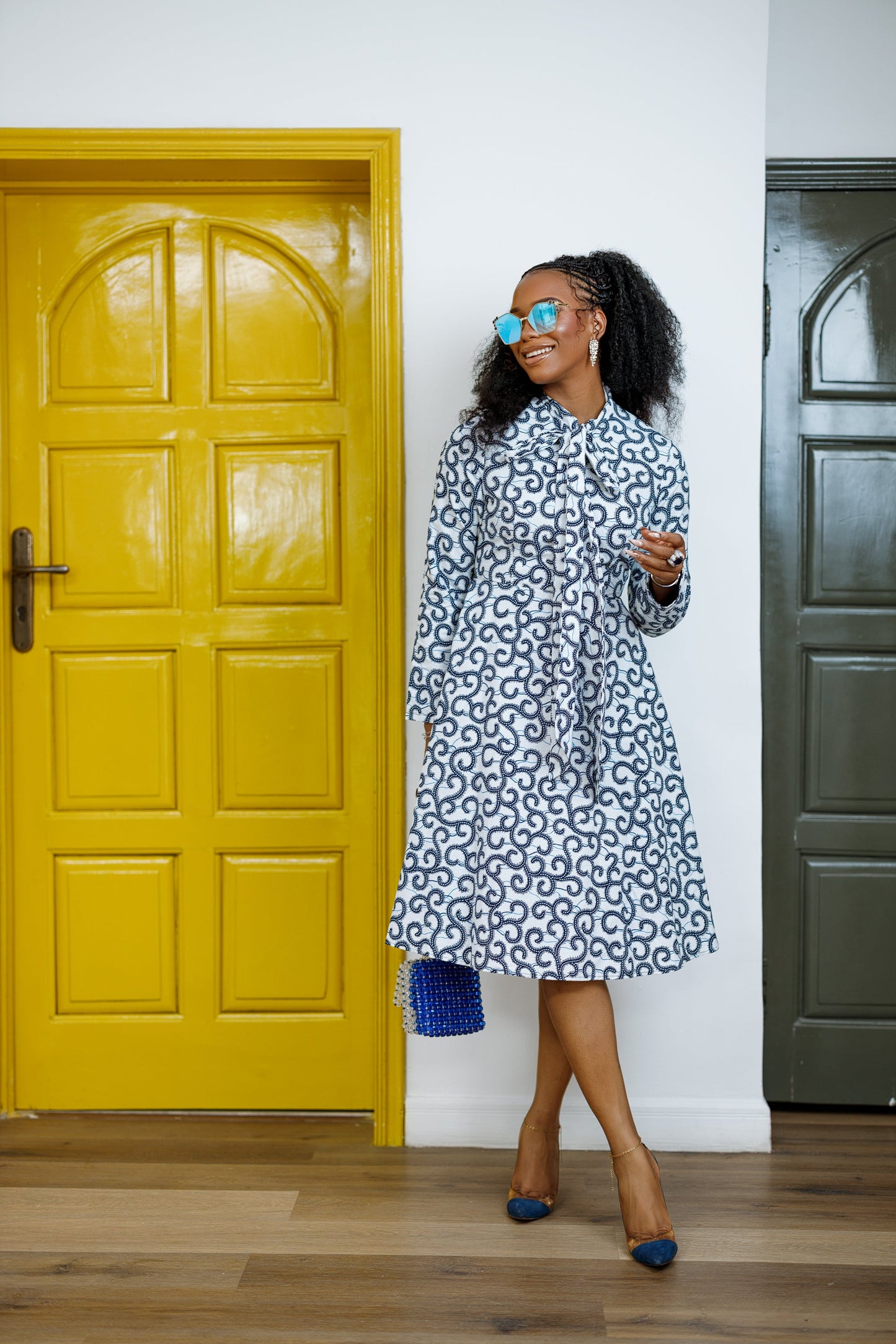 GILDA AFRICAN PRINT TIE-NECK MIDI DRESS